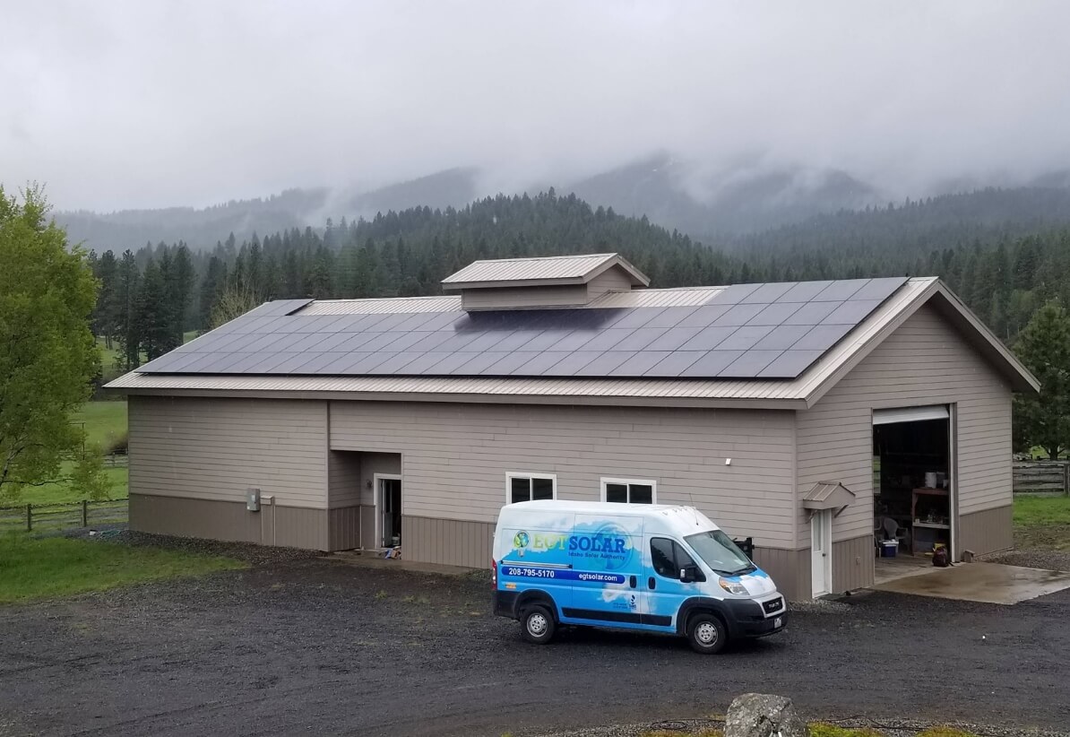 EGT Solar van in front of a residence in the country.